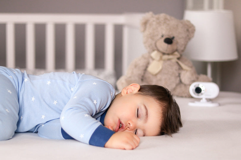 baby boy with baby monitor